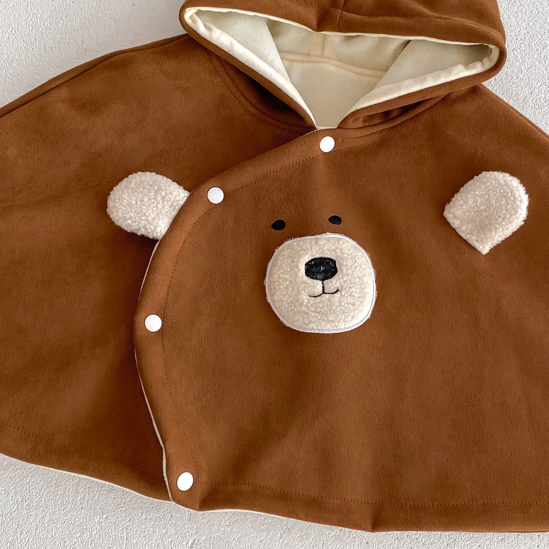 Baby Little Bear Long Sleeves Winter Cloak in coffee color with cartoon bear design, perfect for winter wear.