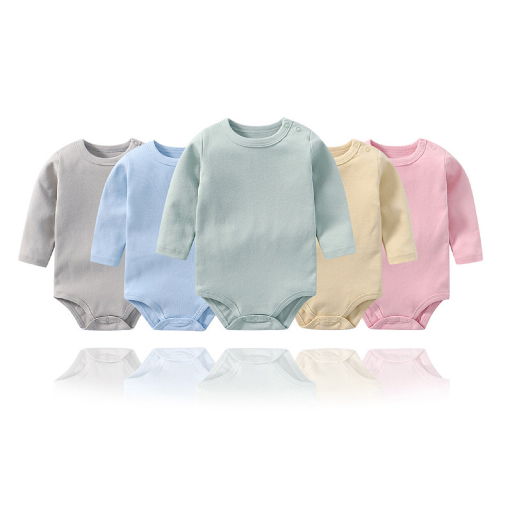 A collection of colorful baby long sleeve cotton onesies in various sizes, showcasing vibrant colors like red, pink, blue, and yellow.