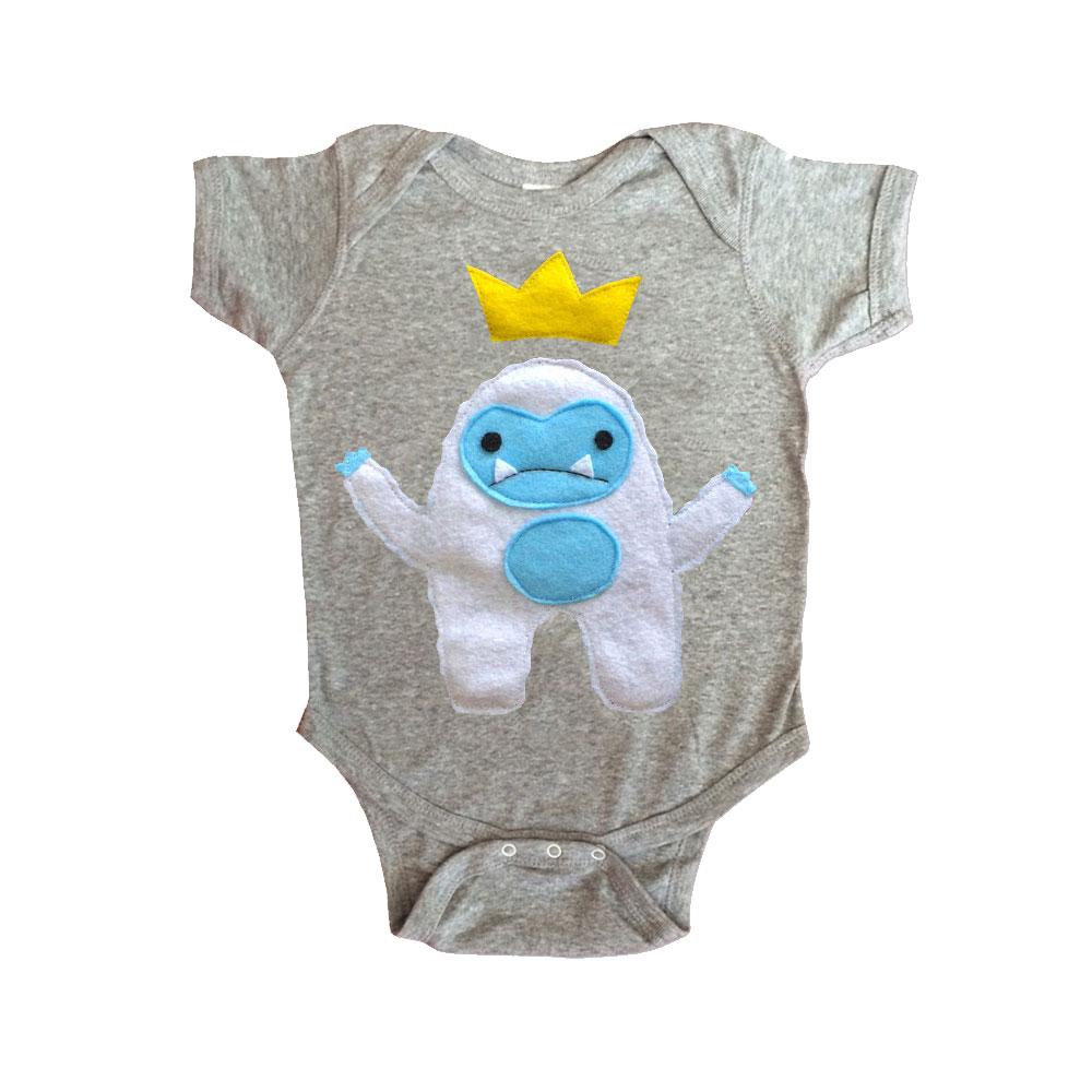 Adorable Baby Onesie featuring a Yeti King design with a crown, handmade and hand-stitched for comfort and style.