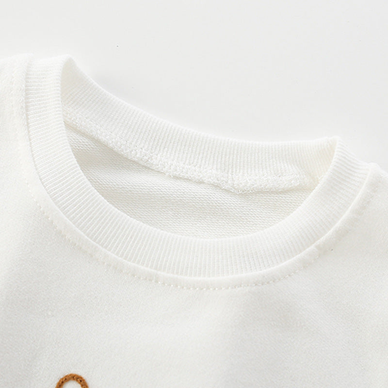 A cozy white hoodie for babies featuring a cute baby plane embroidered pattern, perfect for stylish everyday wear.