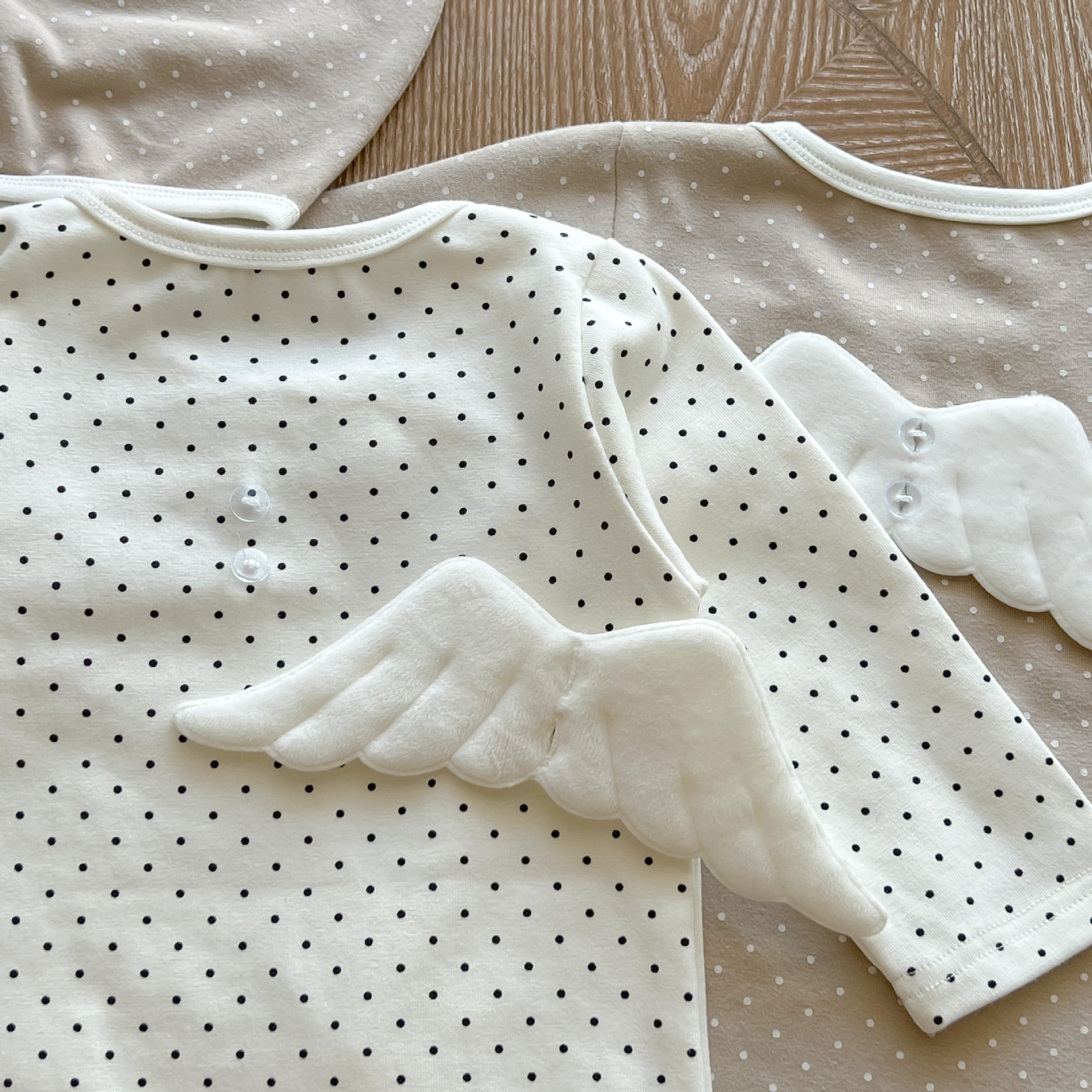 Baby Polka Dot Pattern Bodysuit with detachable wings, showcasing white and khaki colors, perfect for baby girls and boys.