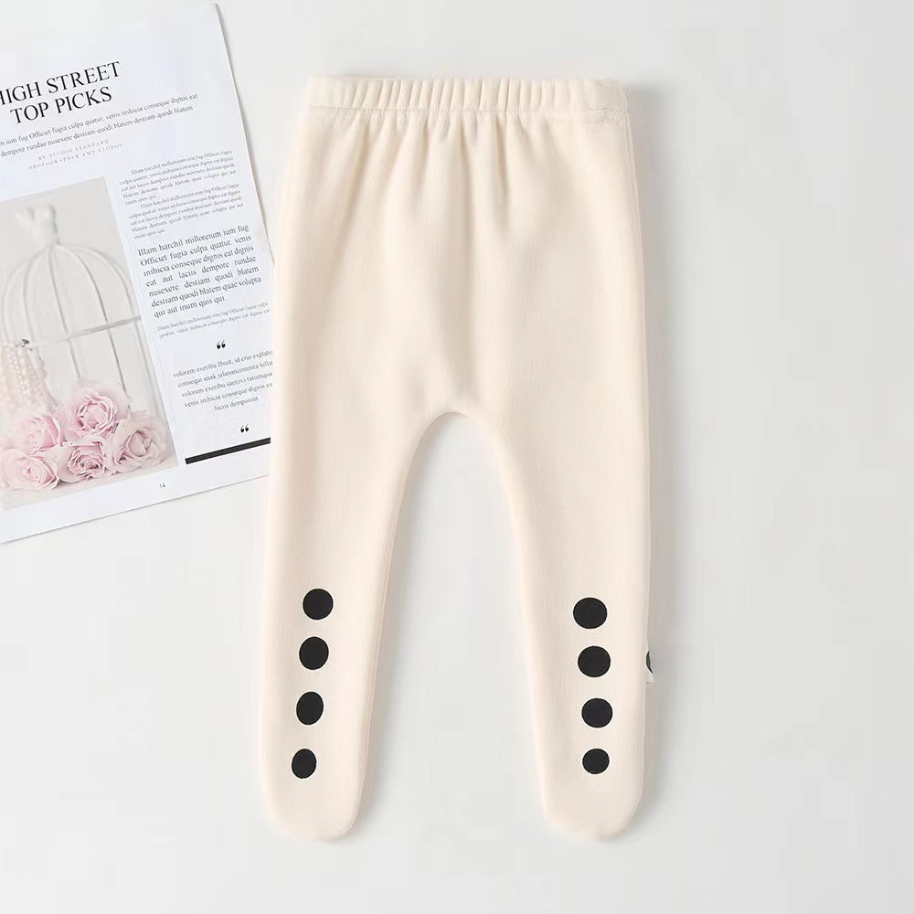 Adorable baby girl outfit featuring polka dot onesies, matching hat, and solid trousers in beige color.