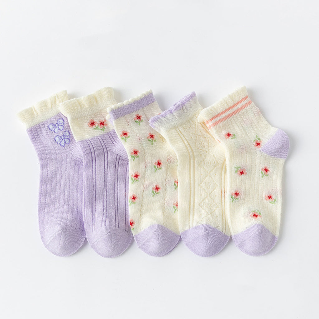 A colorful assortment of Baby Print Pattern Mesh Soft Cotton Socks, featuring cartoon designs and solid colors, perfect for infants and toddlers.