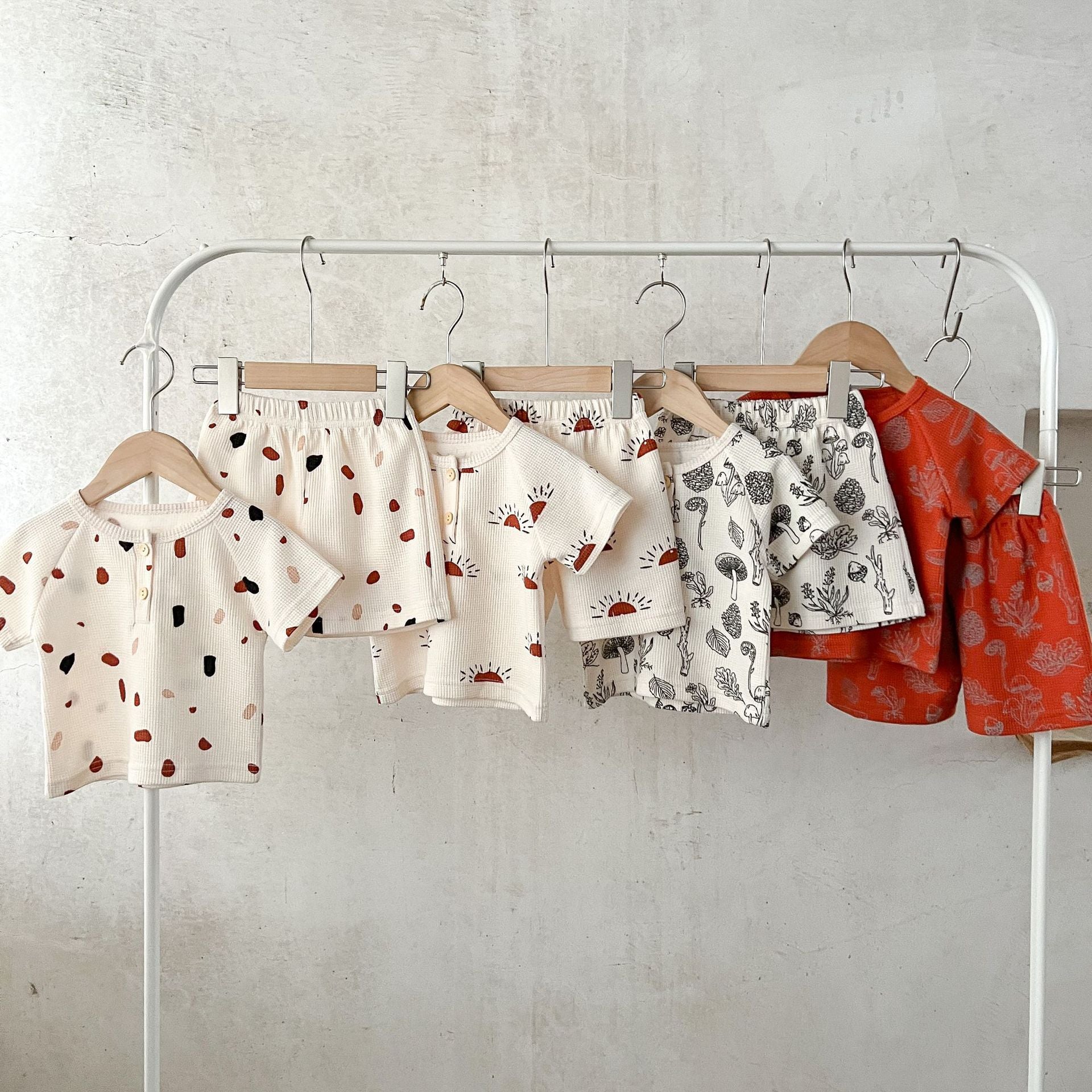 Baby Print Pattern Multi-Style Waffle Fabric Shorts Sets in various colors and patterns, showcasing soft cotton material and stylish designs.