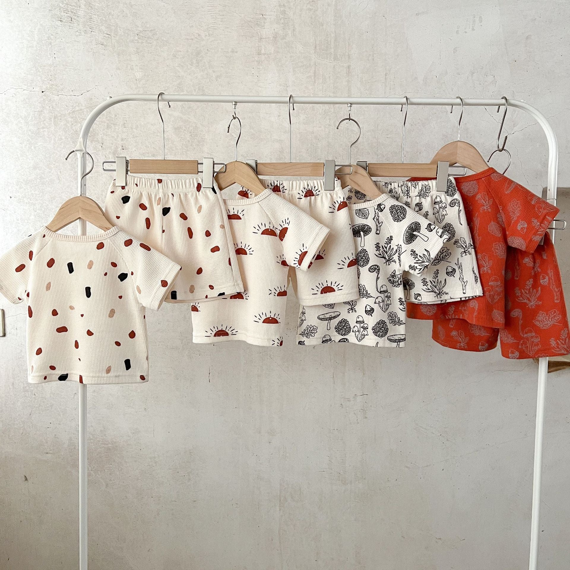 Baby Print Pattern Multi-Style Waffle Fabric Shorts Sets in various colors and patterns, showcasing soft cotton material and stylish designs.