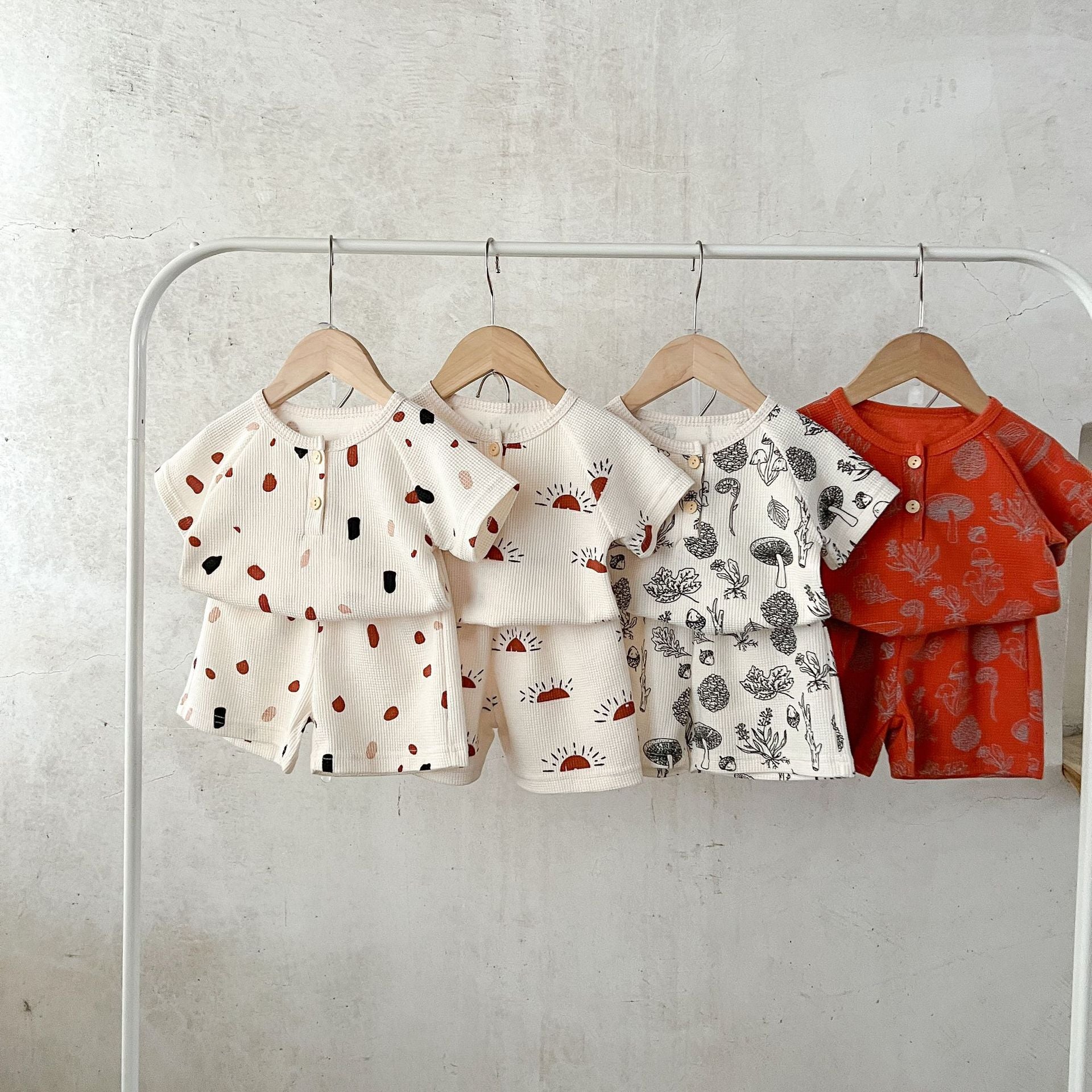 Baby Print Pattern Multi-Style Waffle Fabric Shorts Sets in various colors and patterns, showcasing soft cotton material and stylish designs.