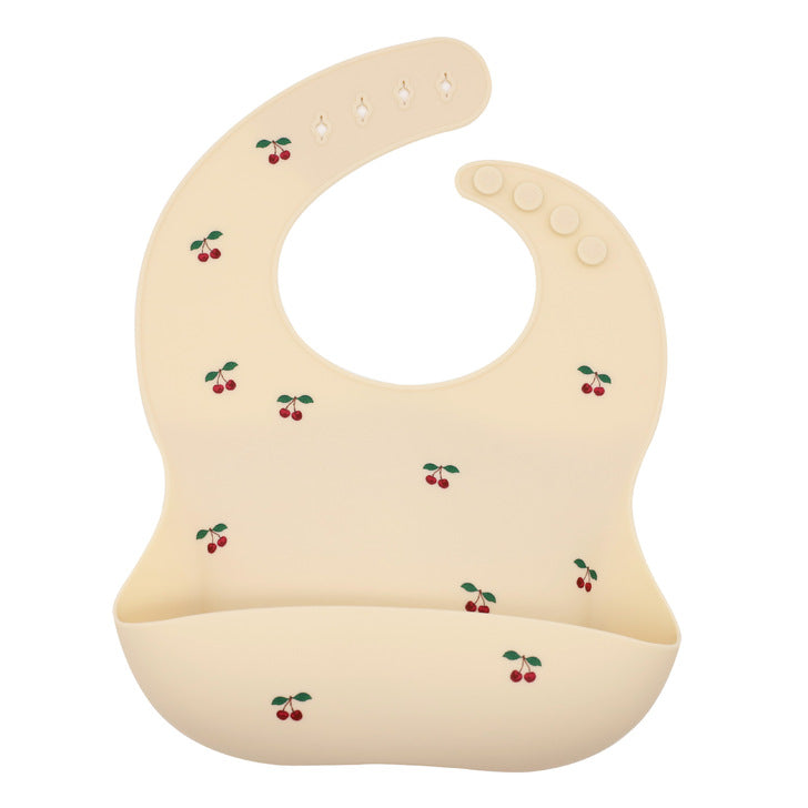 Colorful Baby Printed Pattern Food Grade Silicone Bibs displayed in various colors, showcasing their waterproof and lightweight design.