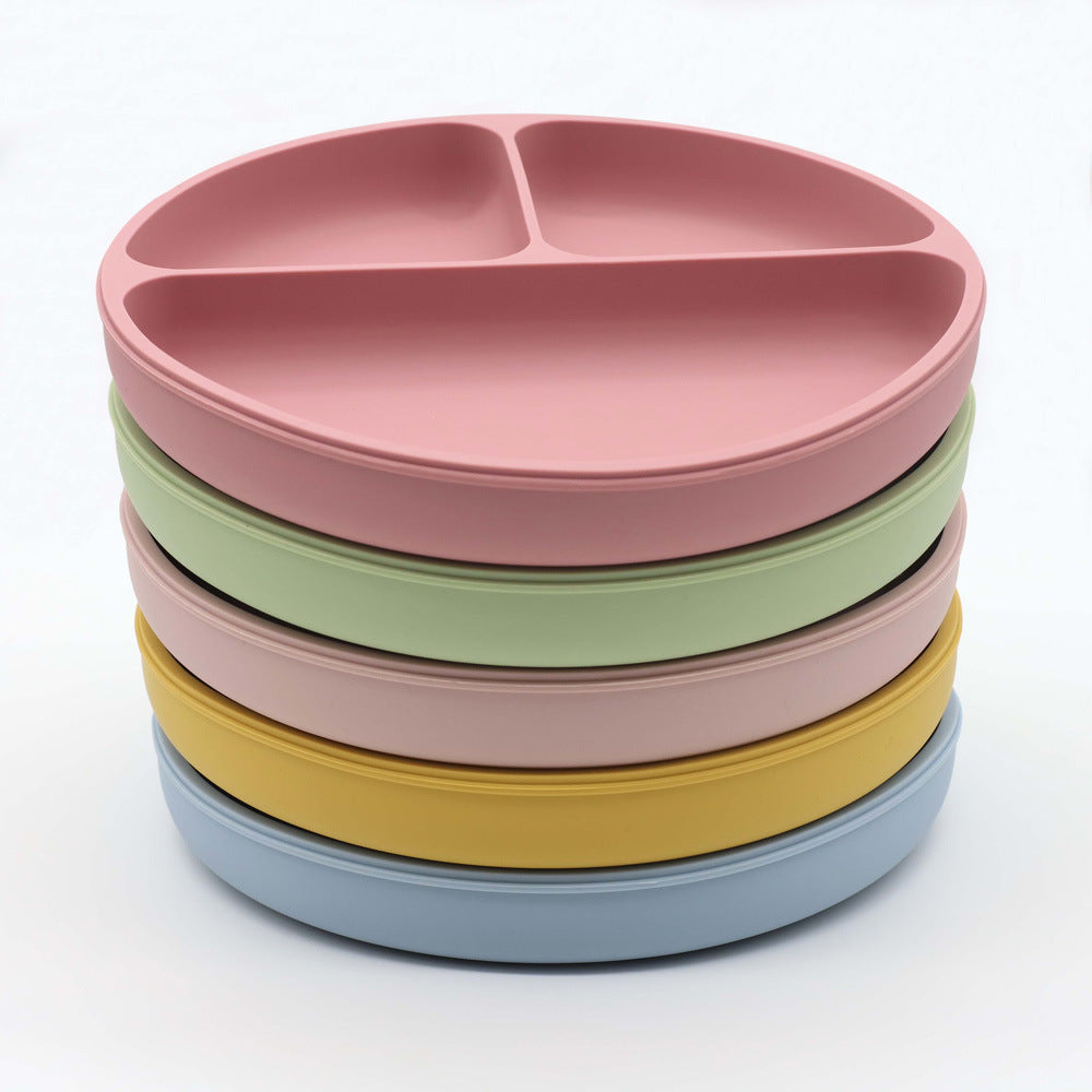 Colorful Baby Silicone Round Sucker Compartment Dinner Plate with Spoon and Fork, designed for mess-free mealtimes.