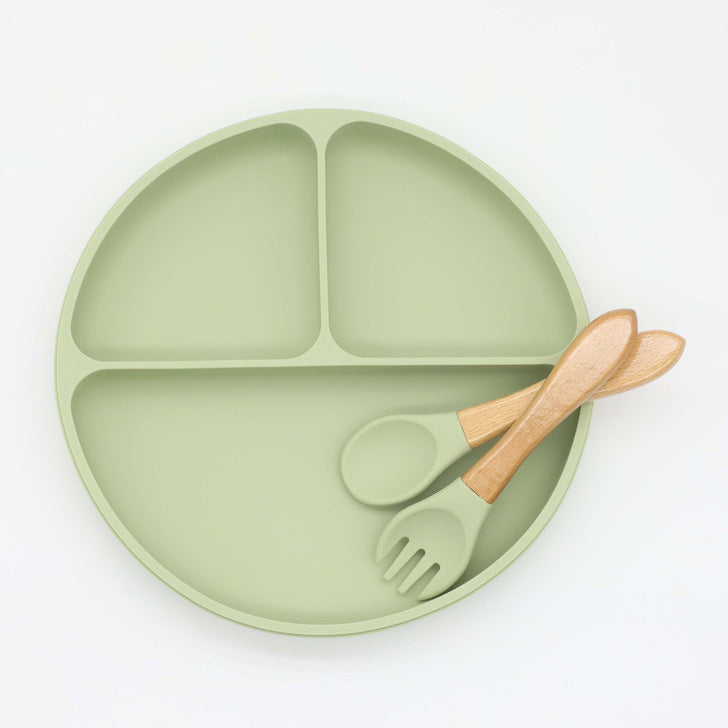 Colorful Baby Silicone Round Sucker Compartment Dinner Plate with Spoon and Fork, designed for mess-free mealtimes.