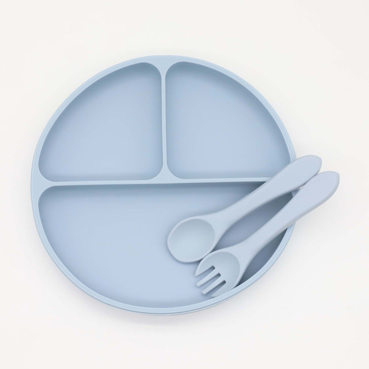 Colorful Baby Silicone Round Sucker Compartment Dinner Plate with Spoon and Fork, designed for mess-free mealtimes.