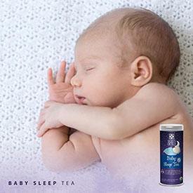 A soothing cup of Baby Sleep Tea with organic ingredients, designed for babies to alleviate tummy troubles and promote better sleep.