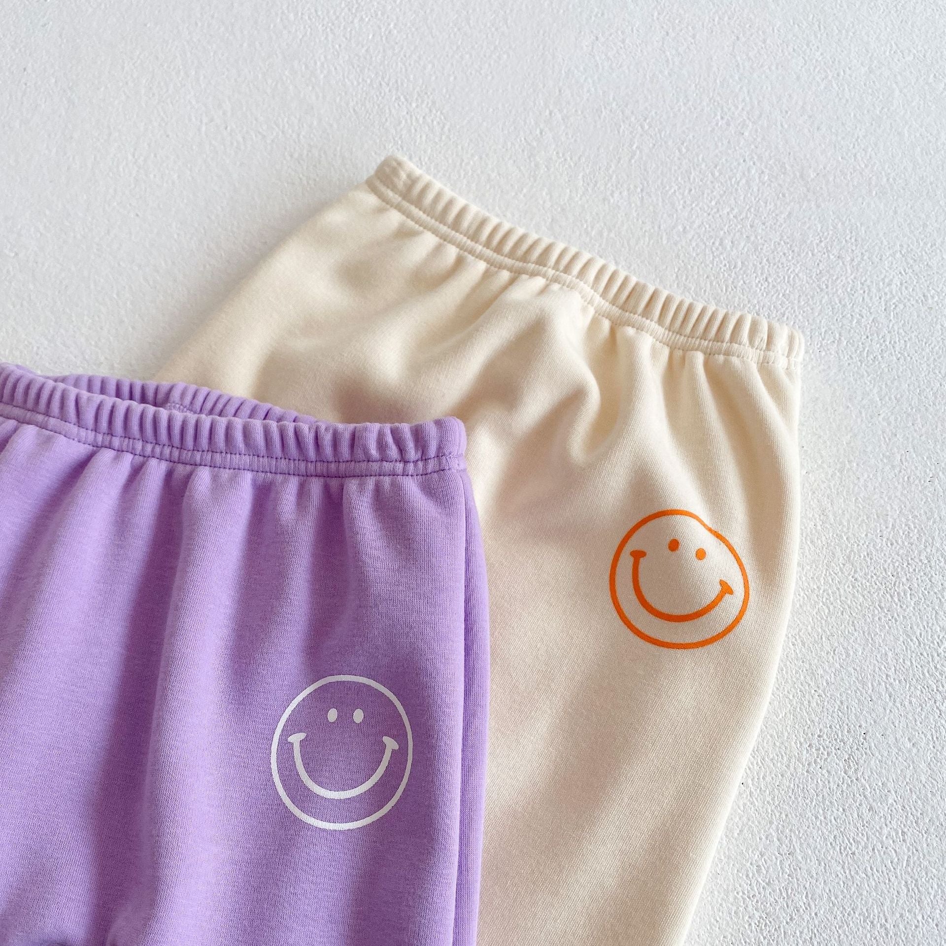 Baby Slogan Graphic Longsleeve Hoodie Combo featuring a smiley print, perfect for boys and girls in purple and beige colors.