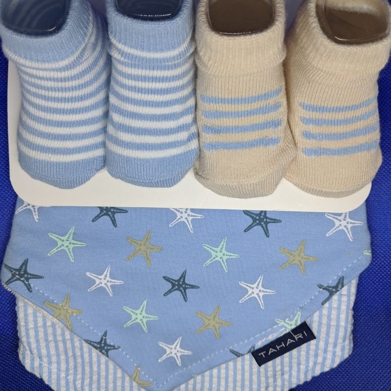 Baby Sock & Bib Set featuring starfish designs, includes two bibs and two pairs of socks in blue.