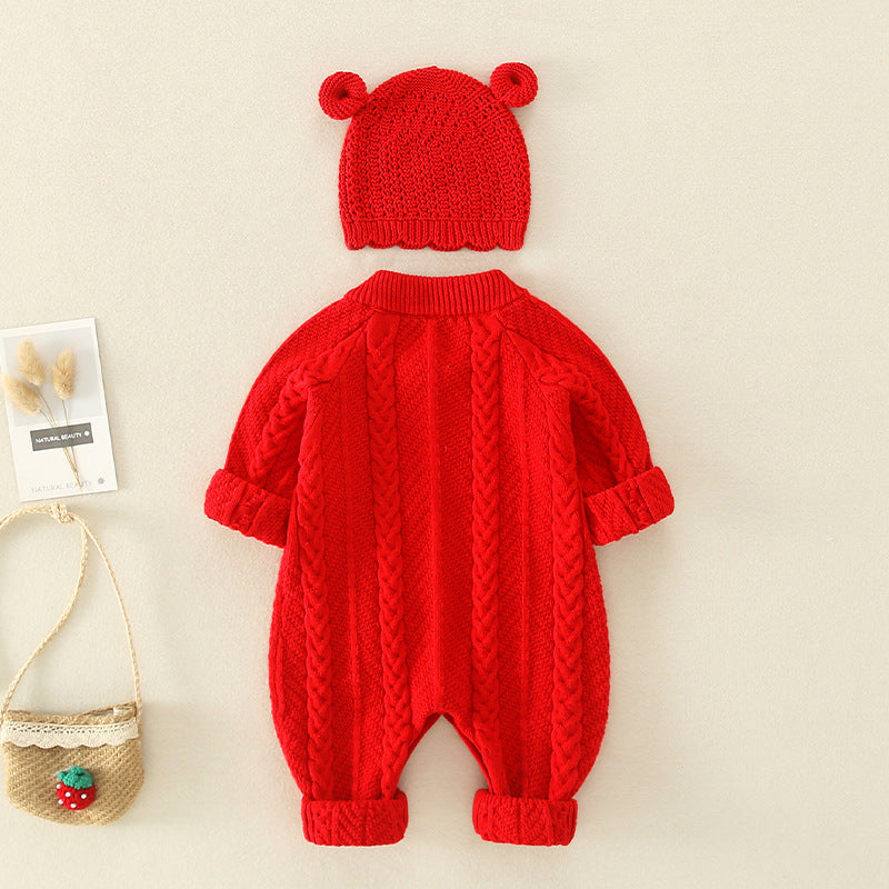 A cute baby wearing a solid color crochet knit romper with cartoon embroidery, showcasing vibrant colors and a comfortable fit.