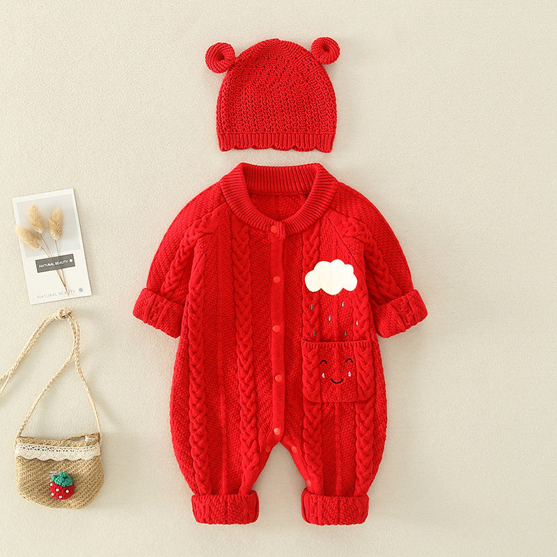 A cute baby wearing a solid color crochet knit romper with cartoon embroidery, showcasing vibrant colors and a comfortable fit.