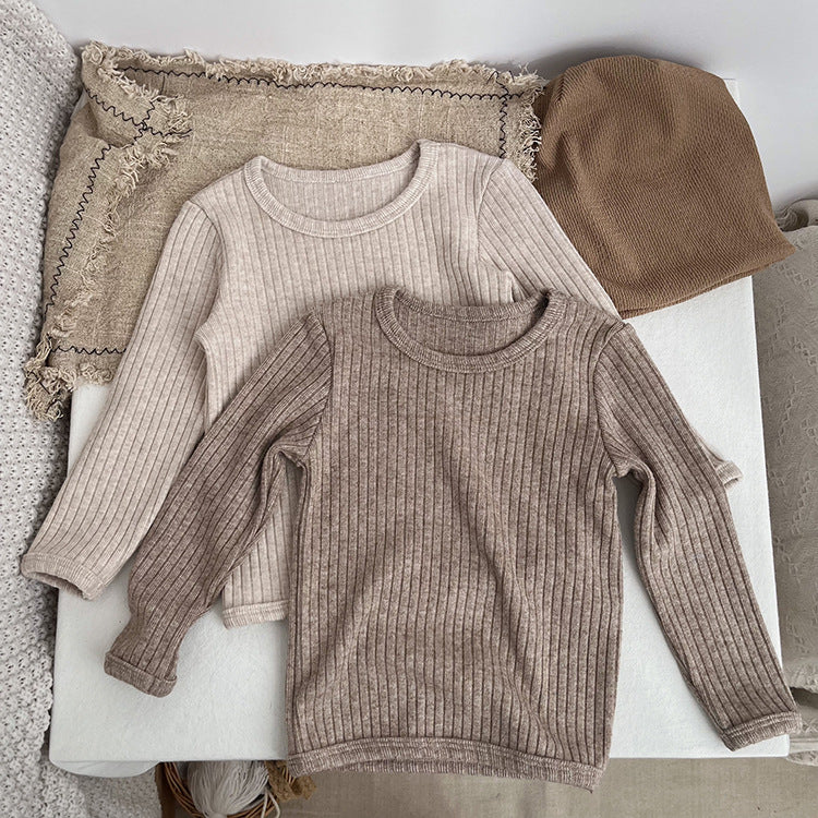 Baby solid color comfy fabric shirt sets in grey and apricot, perfect for lounging at home.