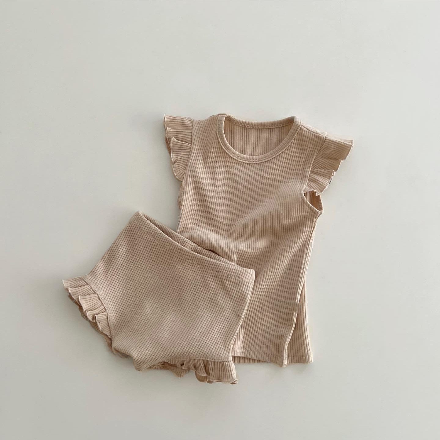 Baby Solid Color Crewneck Tops Sets in beige and brown, made from soft cotton, perfect for summer wear.