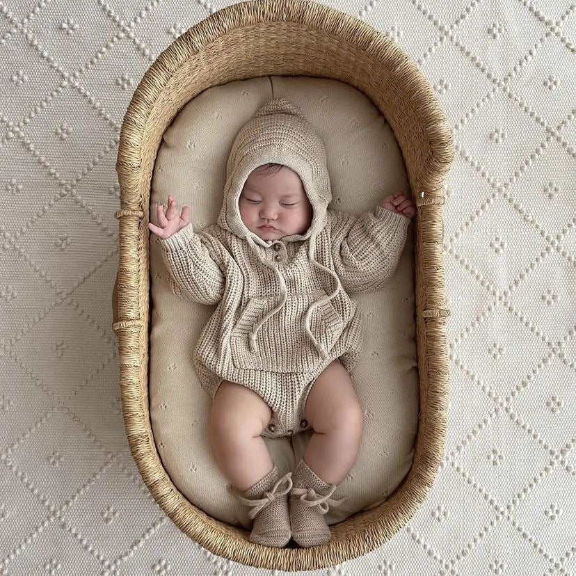 Baby Solid Color Knitted Hooded Triangle Onesie in apricot and brown, showcasing soft cotton fabric and stylish hood.