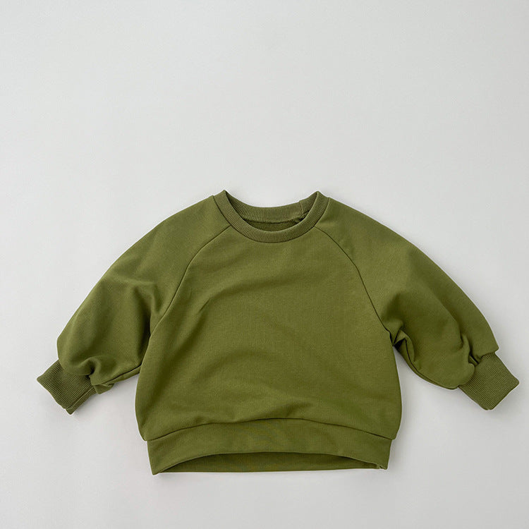 A collection of Baby Solid Color Long Sleeve Pullover Crewneck Hoodies in various colors including pink, green, and apricot, displayed neatly.