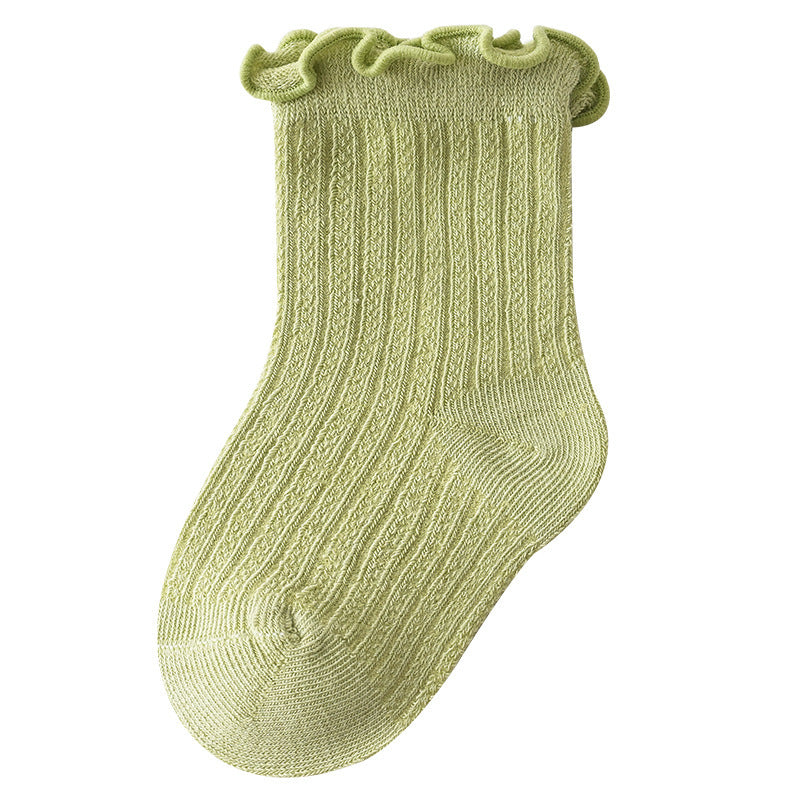 Adorable baby girl socks featuring a breathable mesh design and ruffle detail, perfect for special occasions.