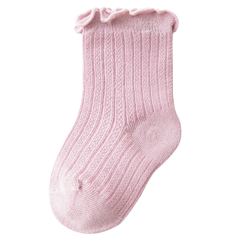 Adorable baby girl socks featuring a breathable mesh design and ruffle detail, perfect for special occasions.