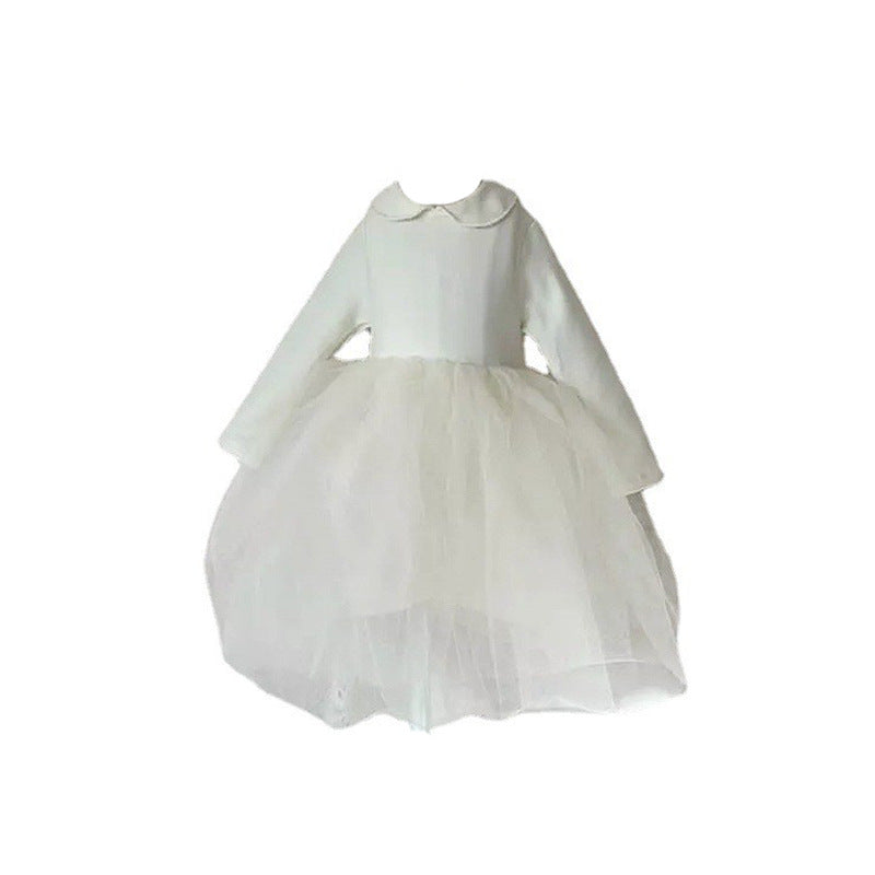 A beautiful baby solid white mesh princess formal dress, featuring soft cotton material and elegant design, perfect for baby girls.