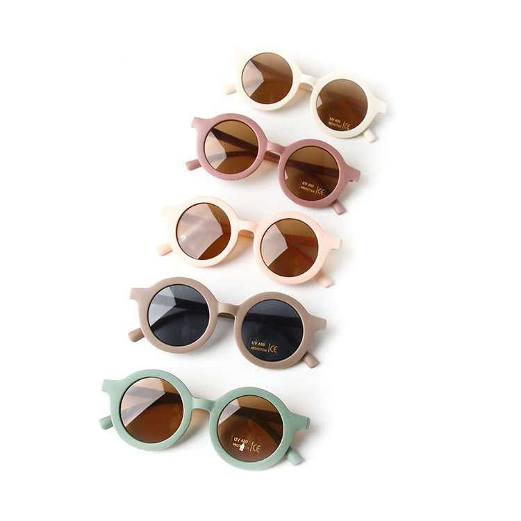 Colorful baby sunglasses designed for children aged 2-5 years, featuring lightweight frames and UV protection.