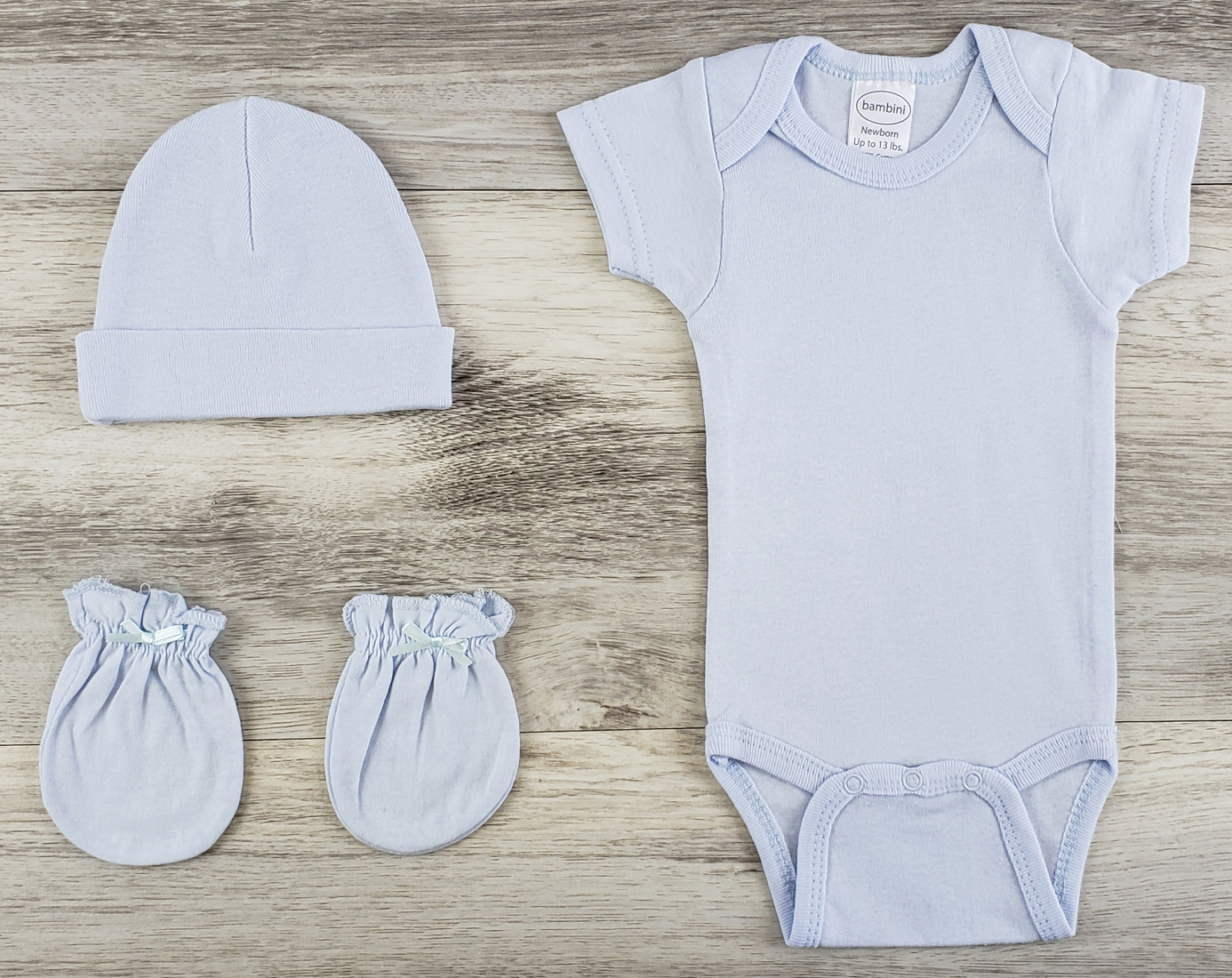 Bambini 3 Pc Layette Baby Clothes Set featuring a blue onesie, cap, and mittens made from soft cotton fabric.