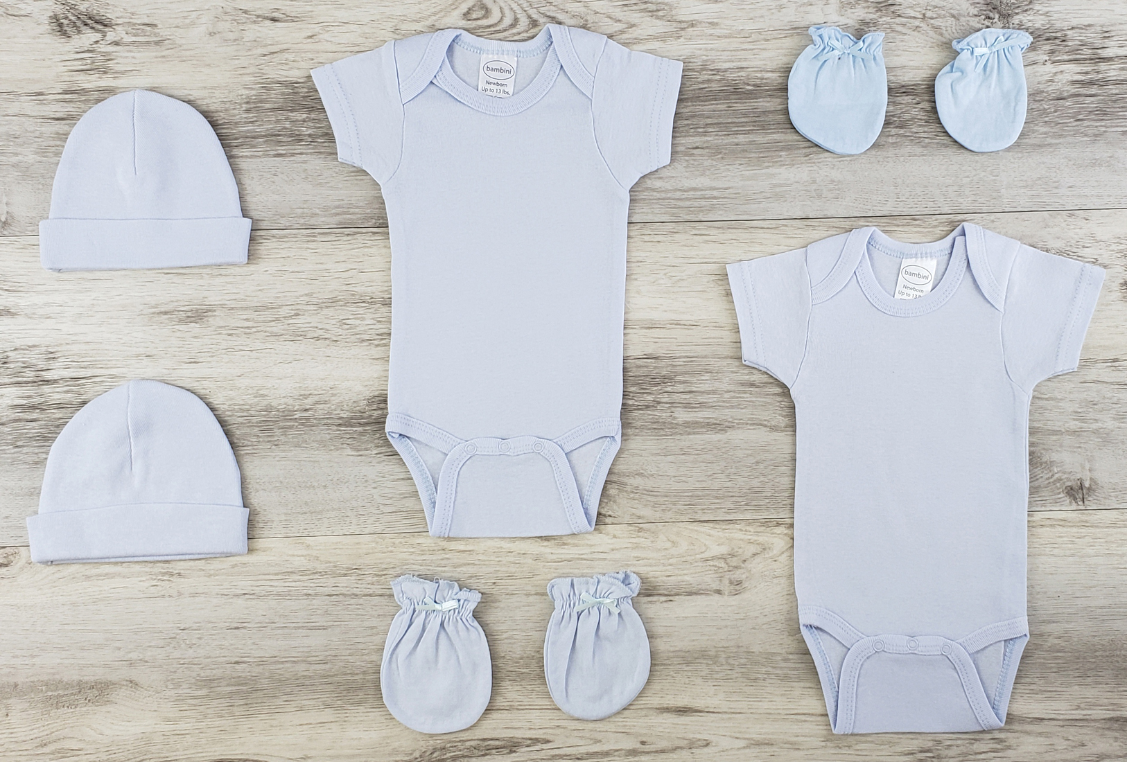 Bambini 6 Pc Layette Baby Clothes Set featuring soft cotton onesies, baby caps, and mittens in blue, perfect for newborns.