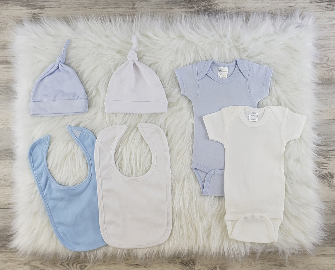 Bambini 6 Pc Layette Baby Clothes Set featuring soft cotton onesies, knotted caps, and bibs in blue and white colors, perfect for newborns.