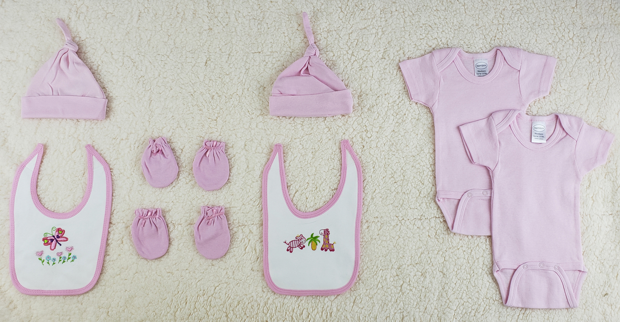 Bambini 8 Pc Layette Baby Clothes Set featuring soft cotton onesies, bibs, baby caps, and mittens in pink and blue colors.