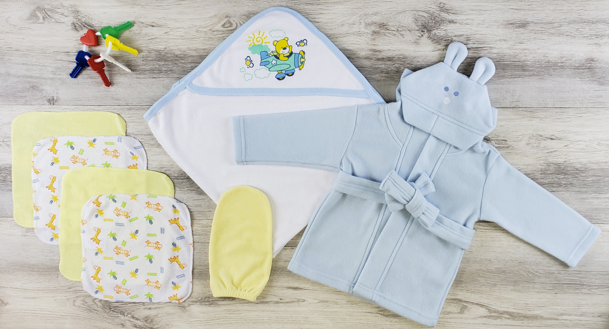 Bambini Hooded Towel set including towel, wash cloth, mitten, and robe in soft cotton and fleece materials, perfect for newborns.