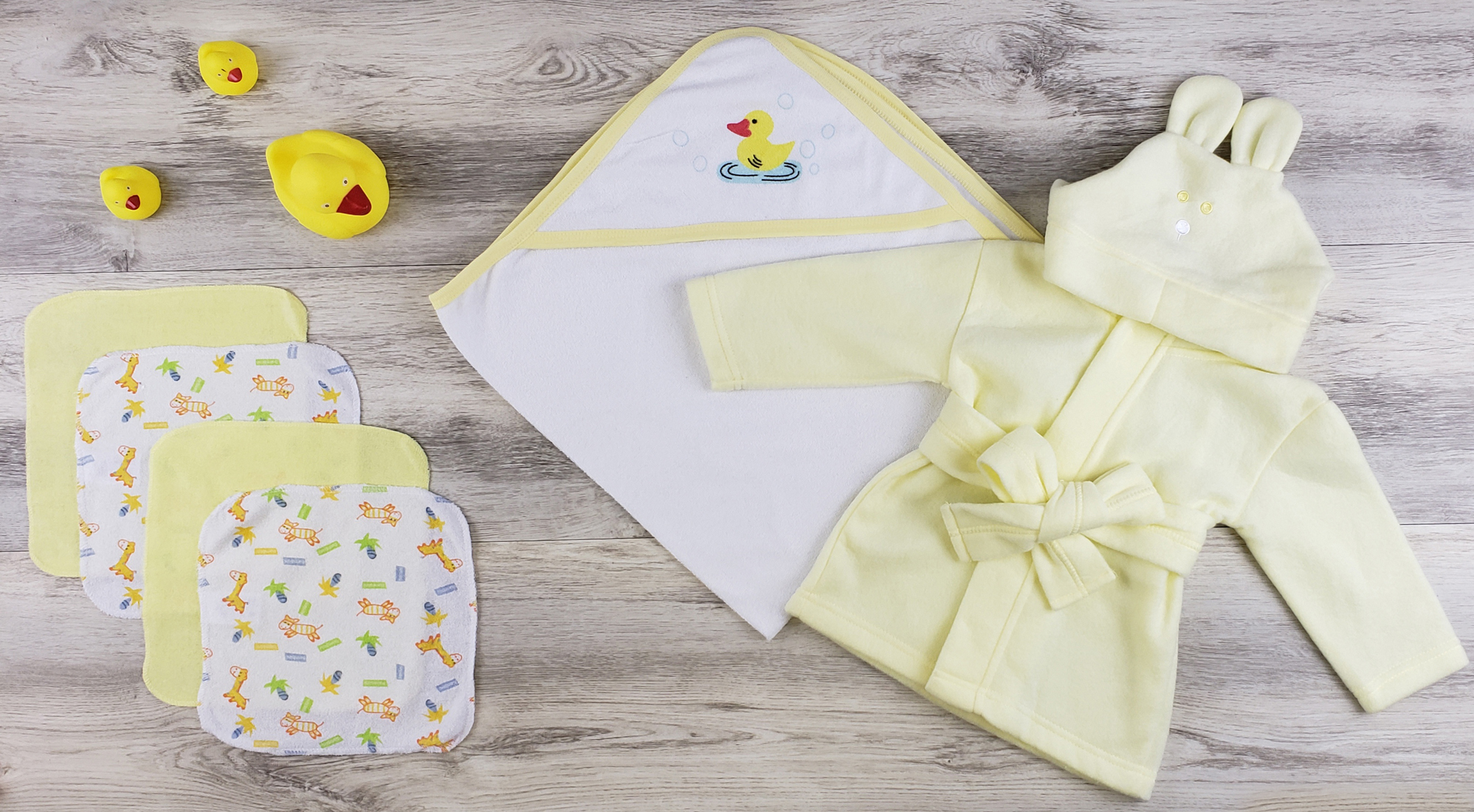 Bambini Hooded Towel set featuring soft cotton towel, washcloths, and a cozy yellow fleece robe with a hood, perfect for newborns.