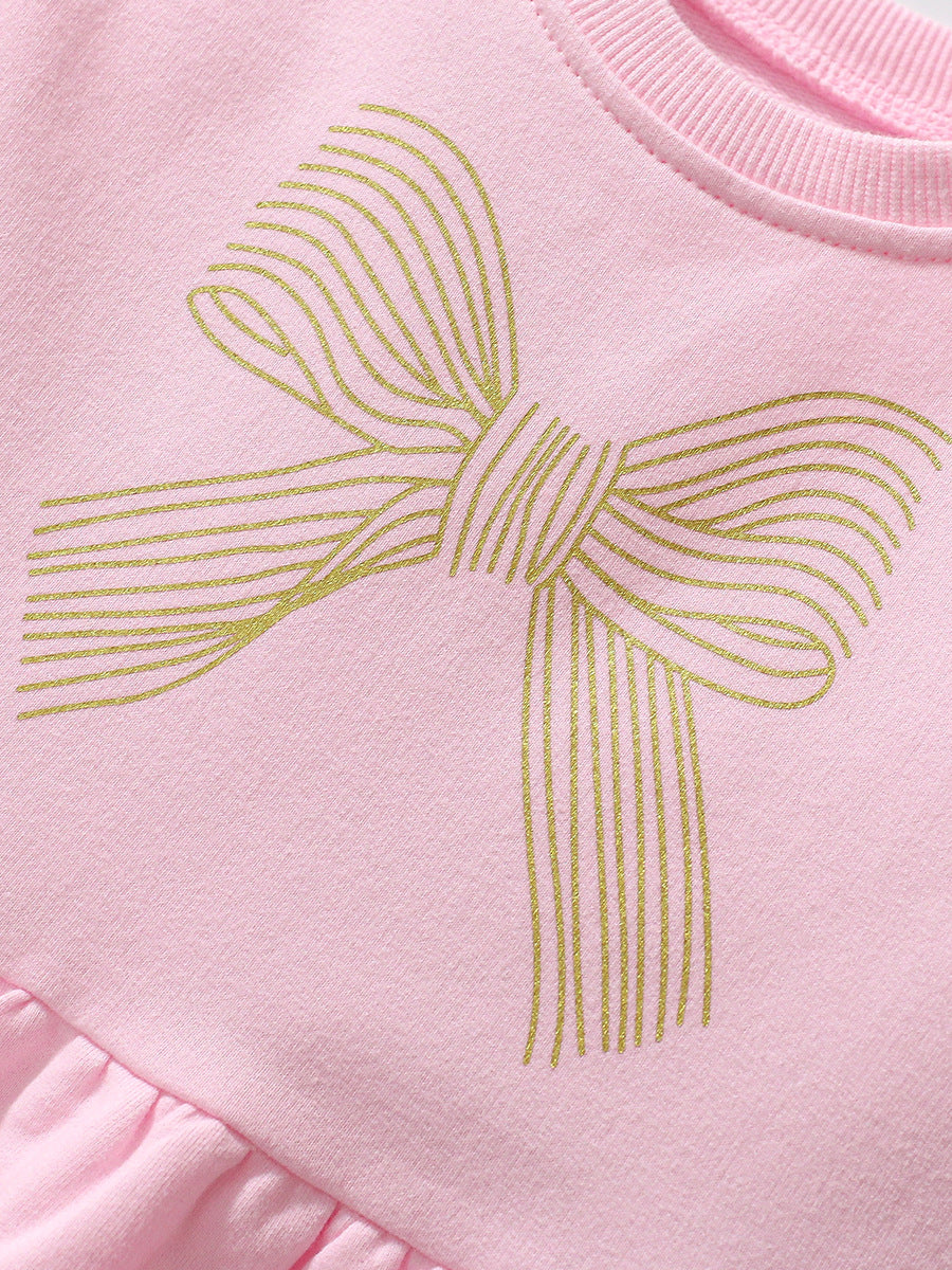 A pink crew neck long sleeve top for girls featuring a geometric bows pattern, made from soft cotton, perfect for autumn wear.