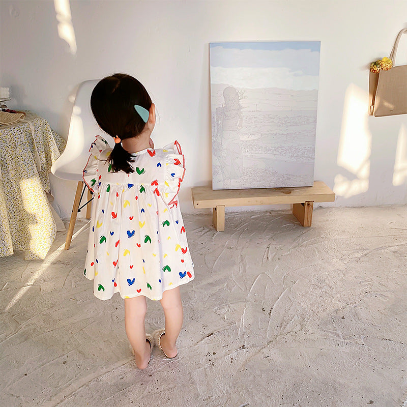 A stylish summer dress for baby girls featuring colorful heart patterns and fly sleeves, made from soft cotton material.