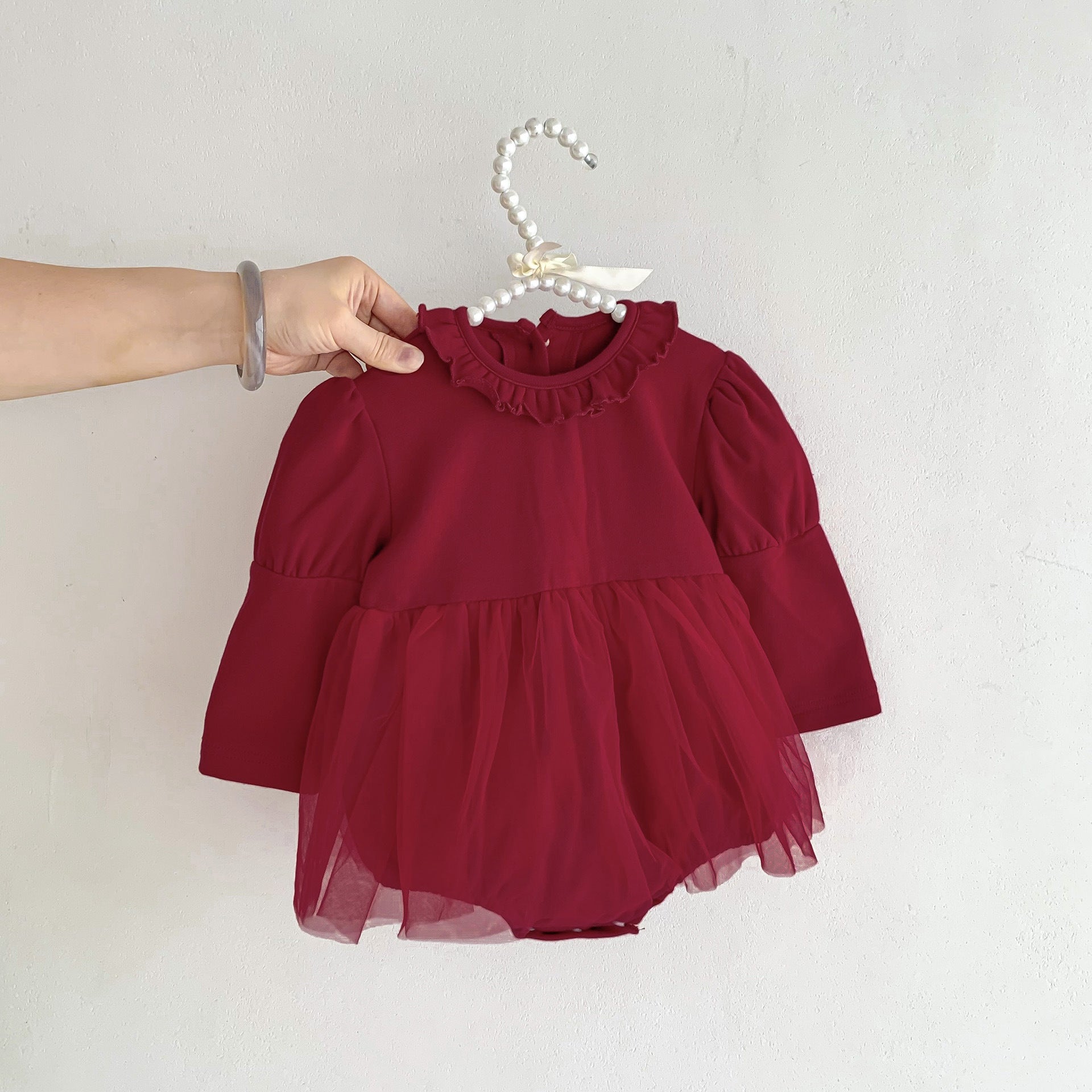 A stylish Birthday Red Mesh Patched Onesies Dress for baby girls, featuring a vibrant red color and soft cotton material with a mesh patch design.