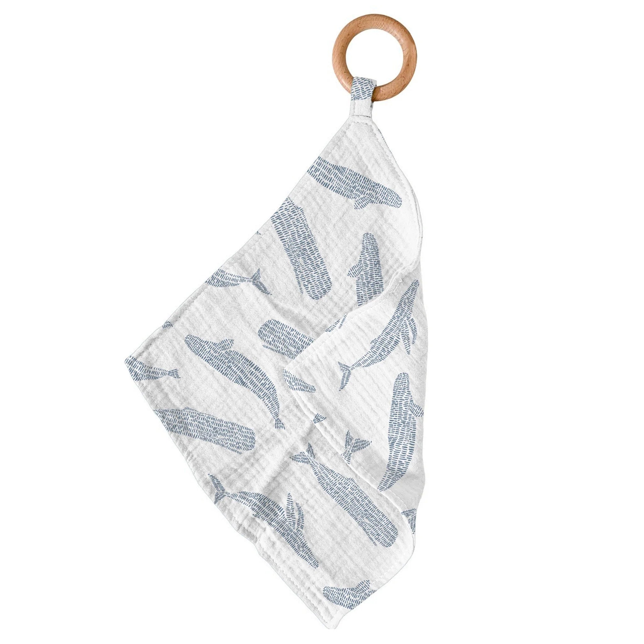 Blue Shadow Whales Bamboo Newcastle Teether featuring a soft bamboo blankie and a removable beach wood ring for teething relief.