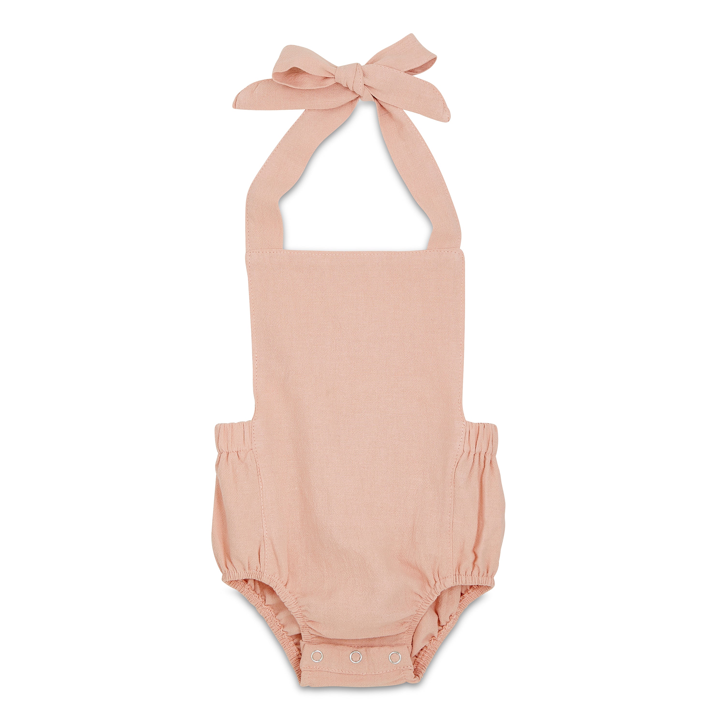 A stylish blush halter romper for babies, made from soft linen with diaper snaps.