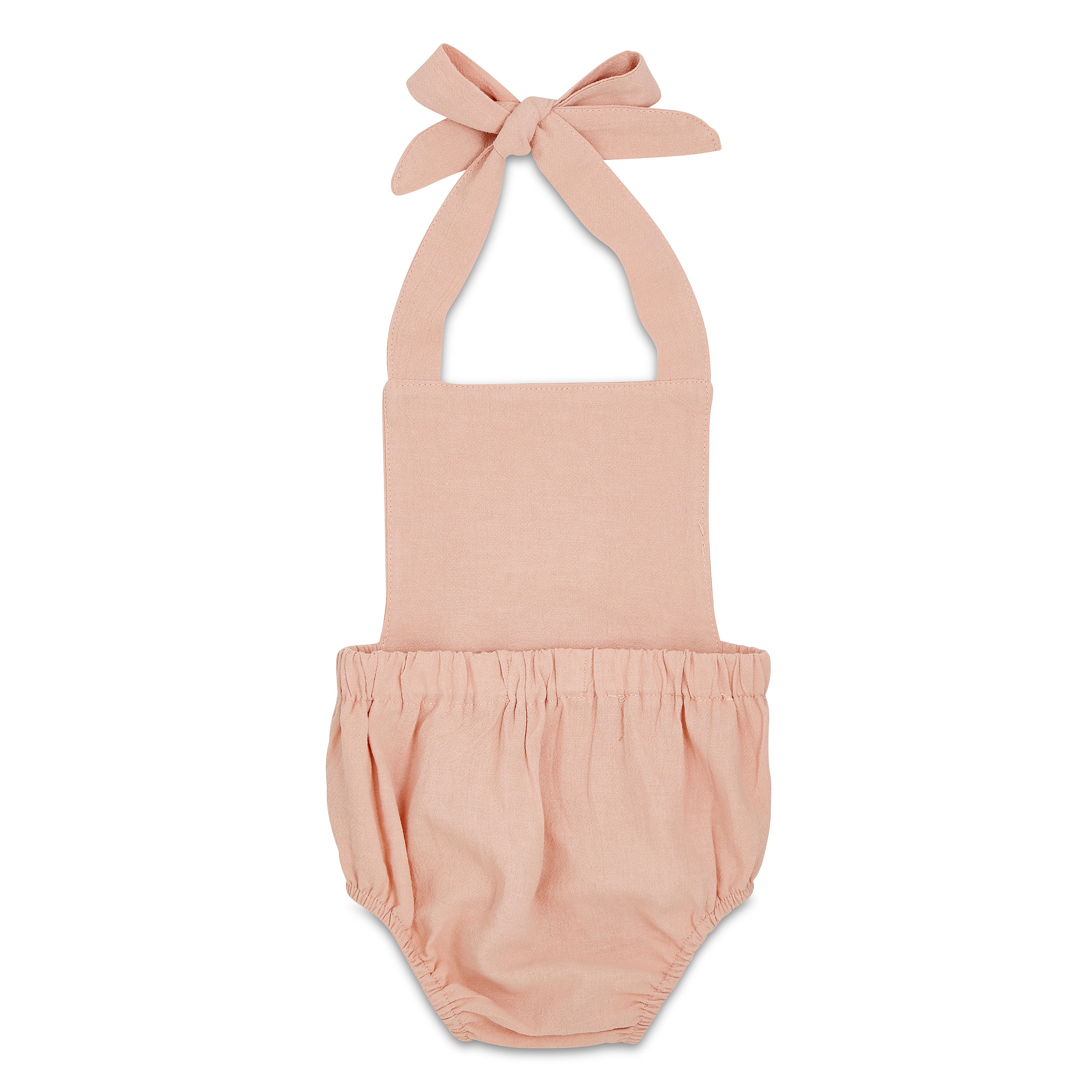 A stylish blush halter romper for babies, made from soft linen with diaper snaps.