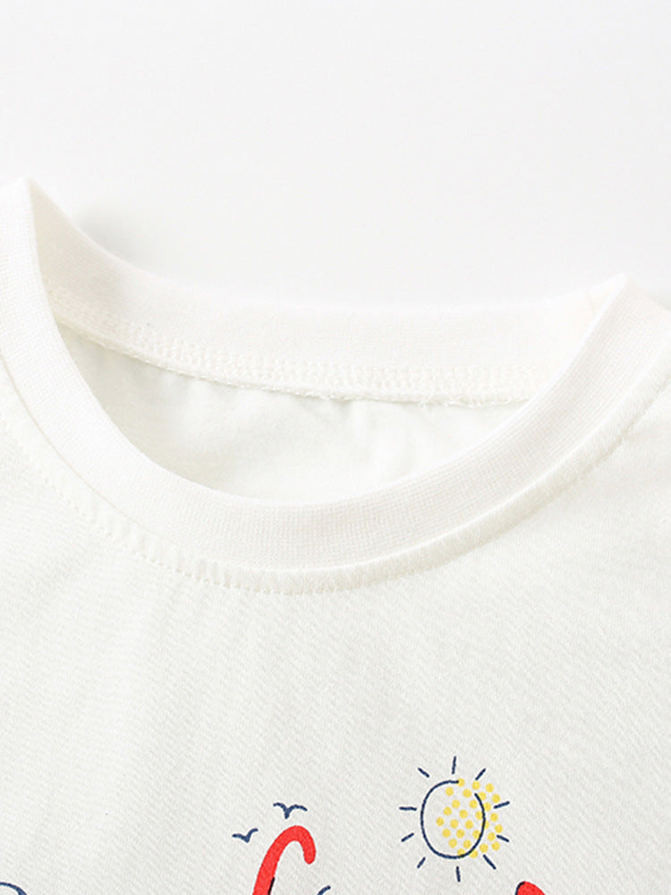 Boys' white t-shirt featuring cartoon and letters print, perfect for summer wear.