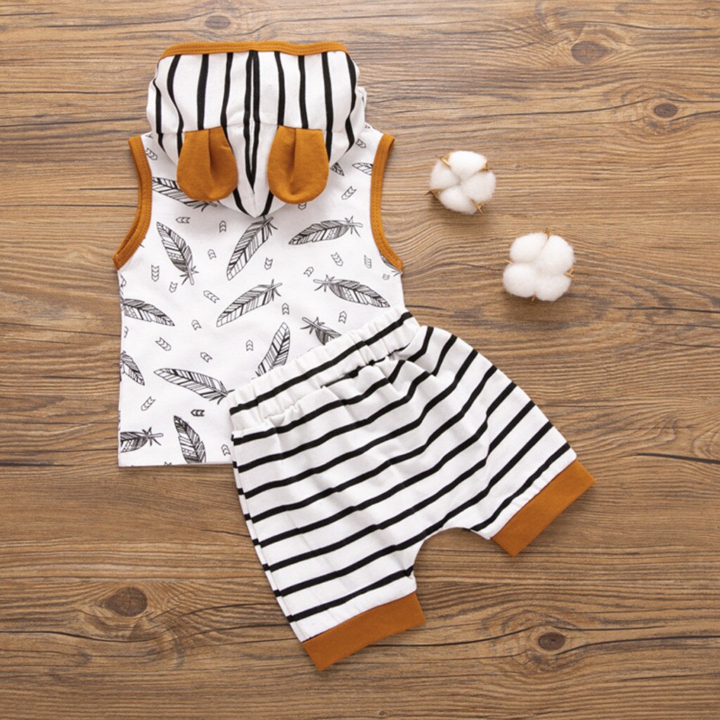 Baby outfit with feather design.