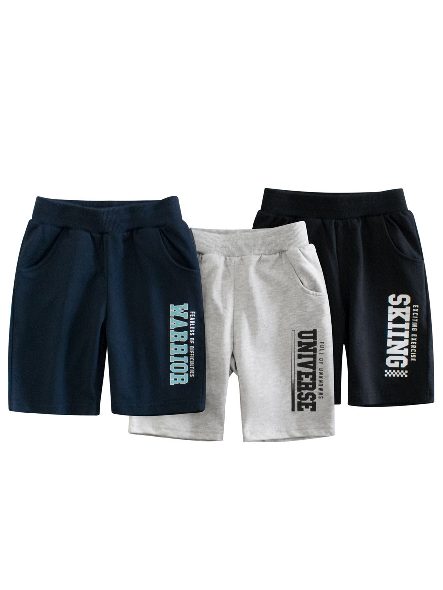 Boys casual shorts featuring a letters print design in black, navy blue, and grey colors, made from soft cotton material.