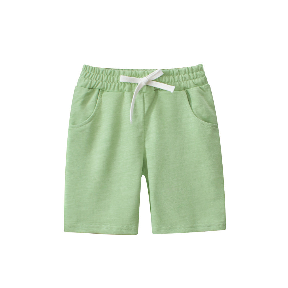 Boys solid color green soft casual style shorts made from cotton, perfect for summer wear, available in various sizes.