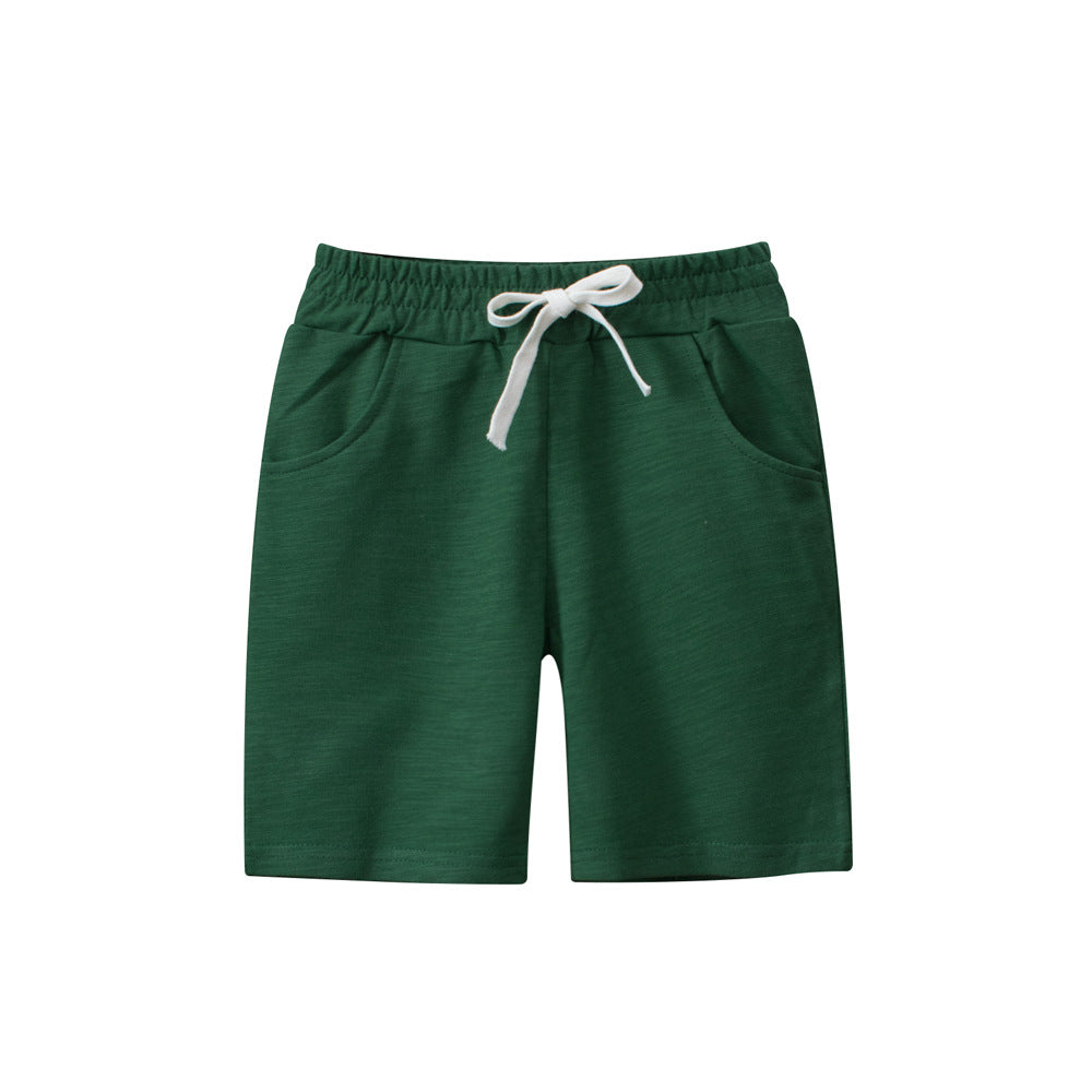 Boys solid color green soft casual style shorts made from cotton, perfect for summer wear, available in various sizes.