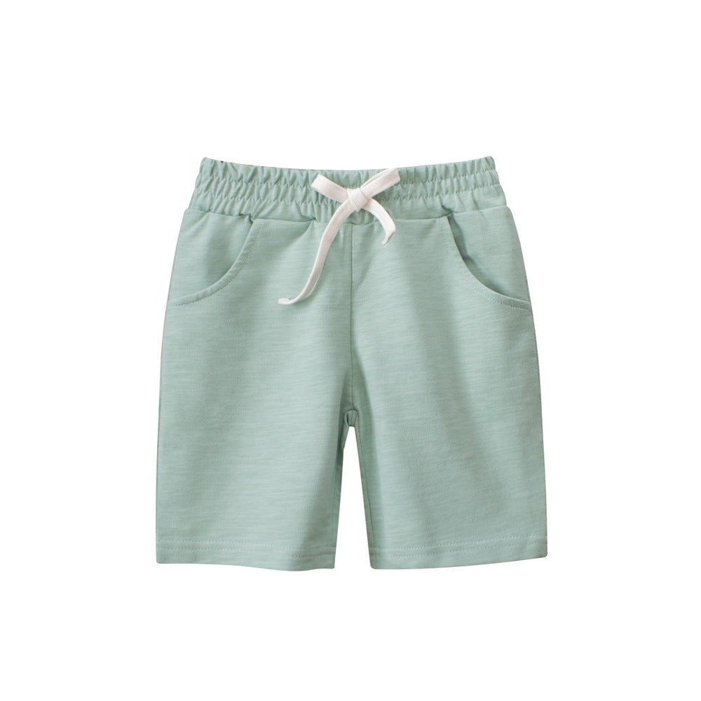 Boys solid color green soft casual style shorts made from cotton, perfect for summer wear, available in various sizes.