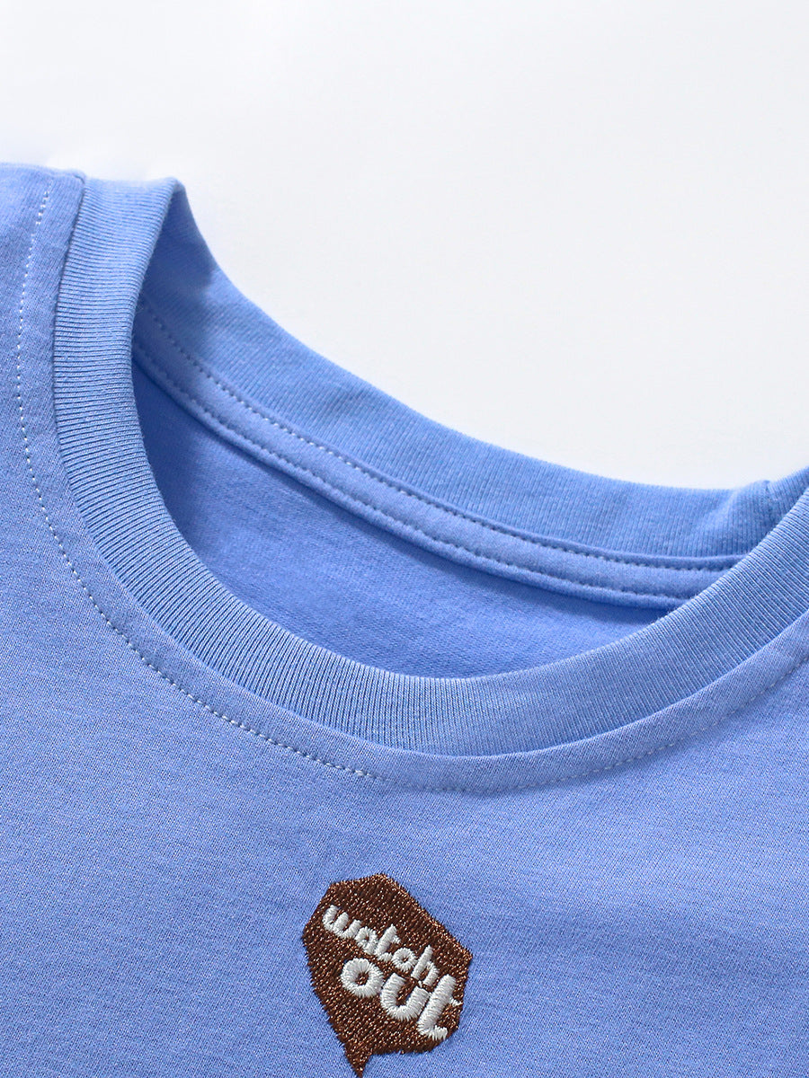 Light blue cotton t-shirt for boys featuring a playful bulldozer cartoon design, perfect for summer wear.