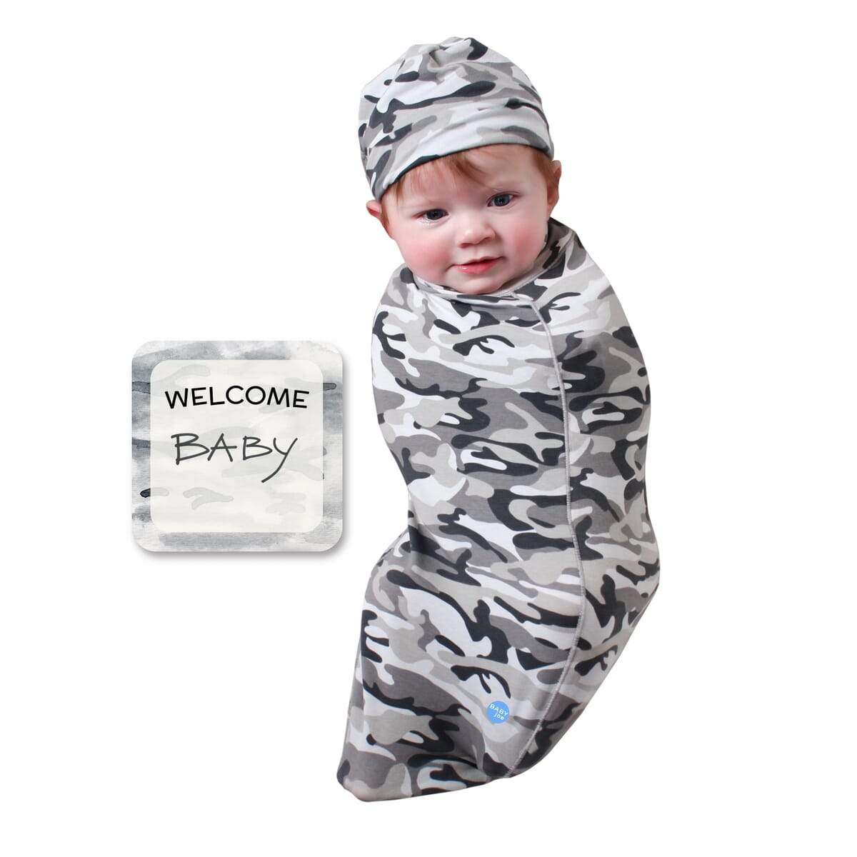 Camo Baby cocoon swaddle set featuring soft fabric, matching headpiece, and newborn announcement card, perfect for cozy moments.