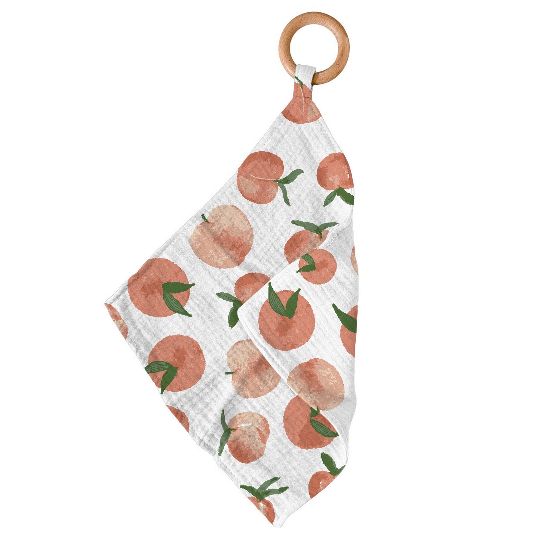 Carnelian Peaches Newcastle Teether featuring a bamboo mini blankie and a removable beach wood ring, perfect for soothing teething infants.