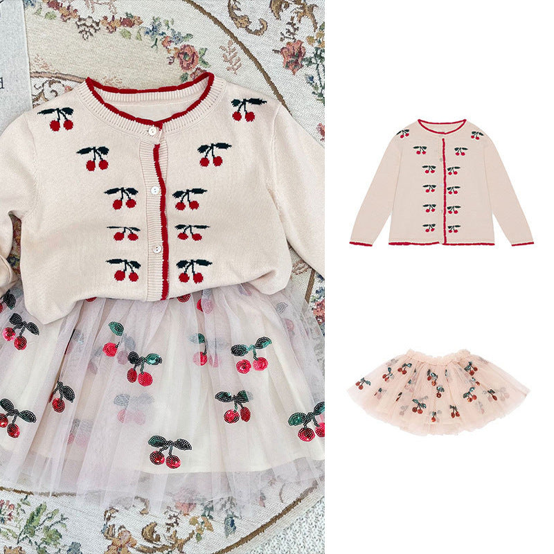 A beige cardigan for baby girls featuring cherry embroidery design, made from soft cotton material.