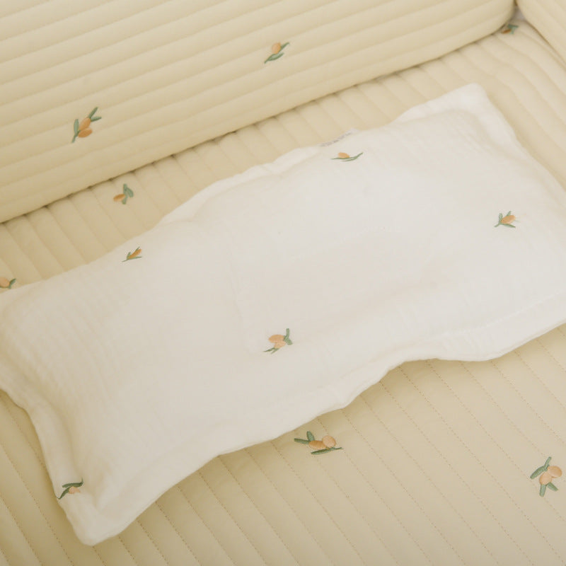 Children Molded Pillow in pink, green, and brown colors, made of soft gauze cotton with embroidered patterns.